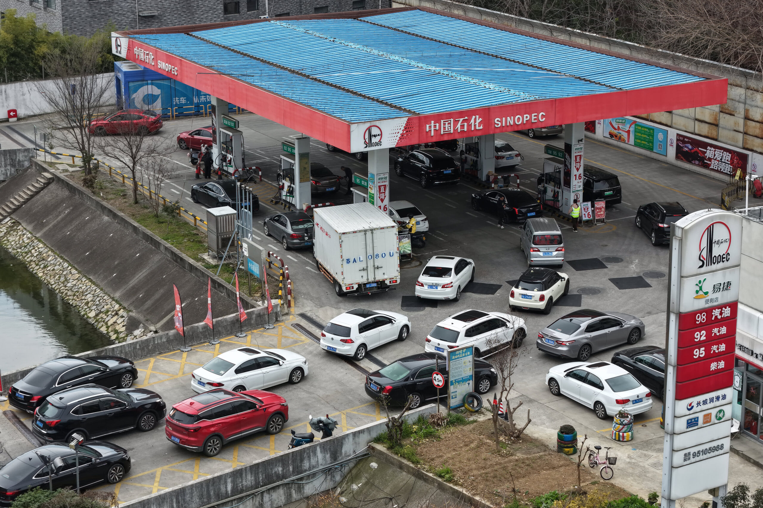 China sees long lines at the gas pump as Mideast turmoil hits