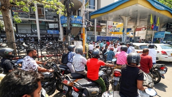 Panic buying sees long queues at petrol pumps despite government assurances amid the US-Iran war