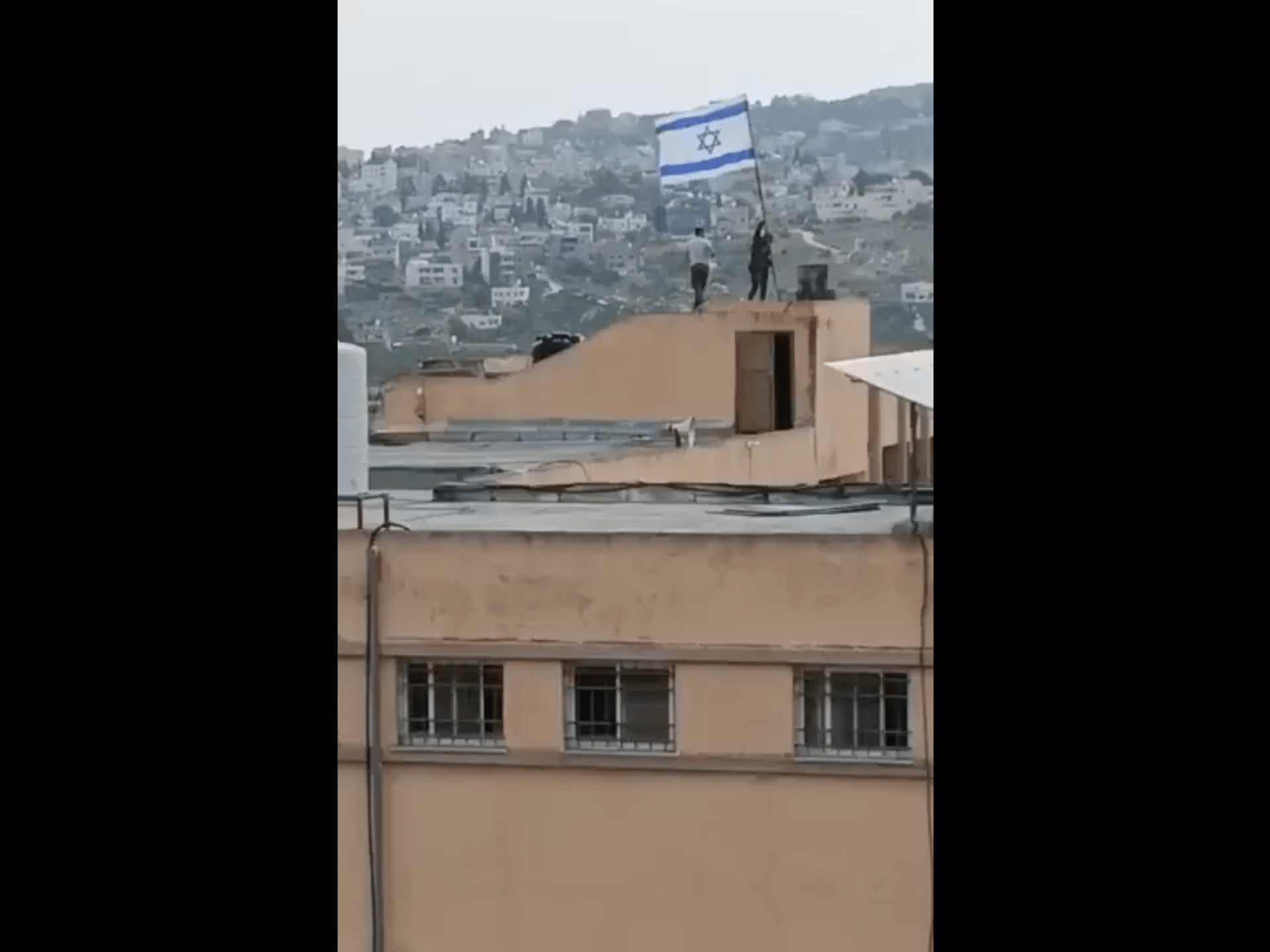 Israeli settlers vandalise school, raise Israeli flag in occupied West Bank
