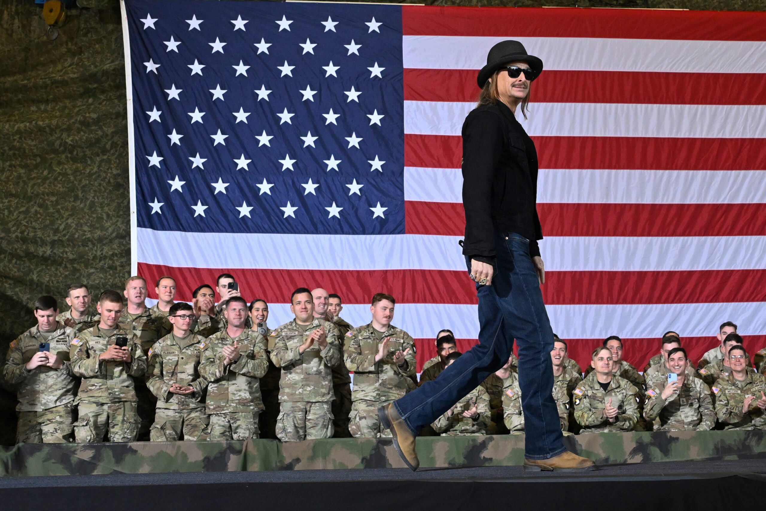 Army reviewing after helicopters hovered alongside Kid Rock's swimming pool as he saluted