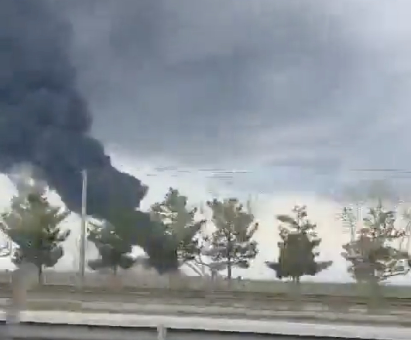 Smoke rises over Mashhad, Iran, following strike near airport