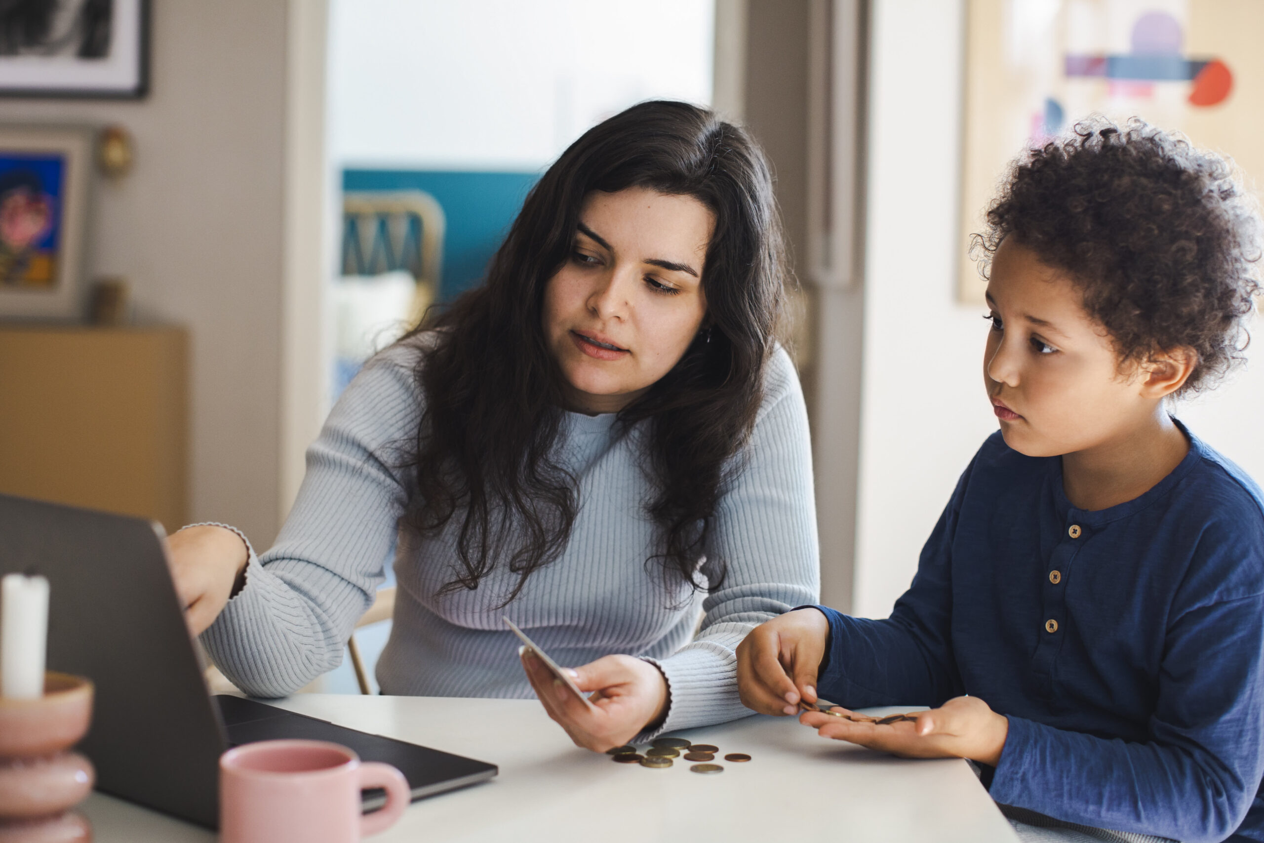 Gen Alpha kids are earning money. Here's how parents can help them save and invest
